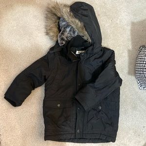 Kids H&M coat size 4/5 in black with removable hood.